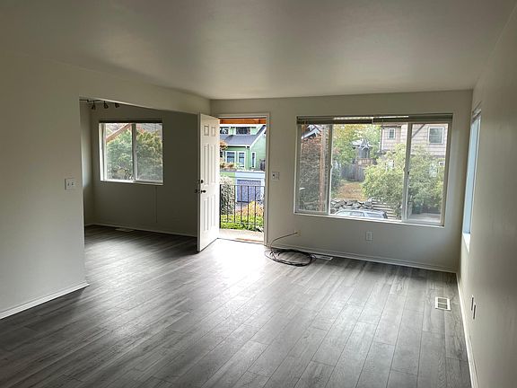 Living room with brand new luxury vinyl plank floors. It is cable ready!
