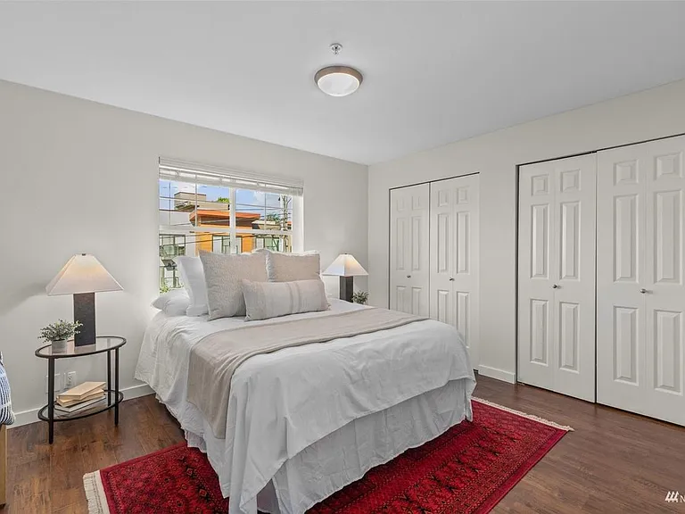 Primary bedroom with full wall of closet space