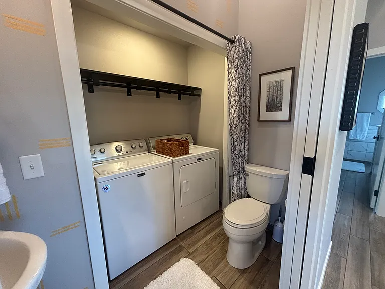 1/2 bath laundry center and commode