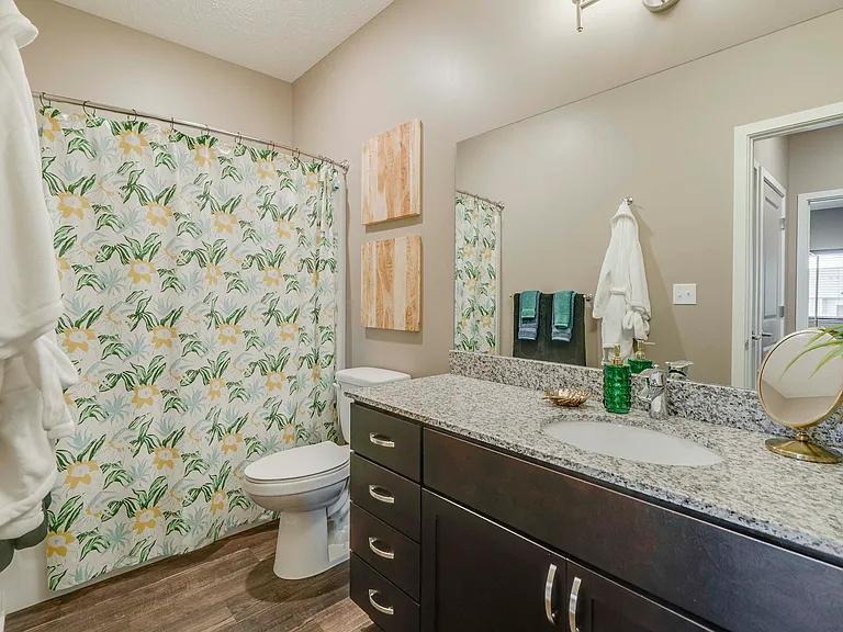 Our bathrooms include spacious vanities with ample storage, perfect for keeping your essentials organized.
