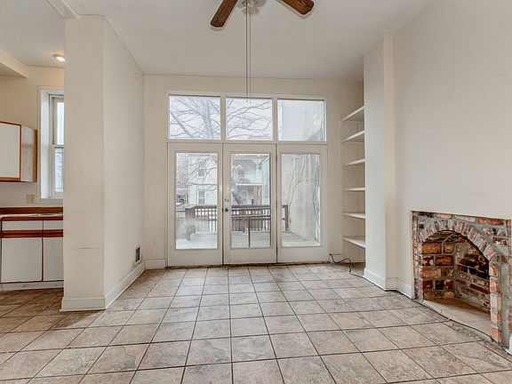 View into dining room with Transom windows