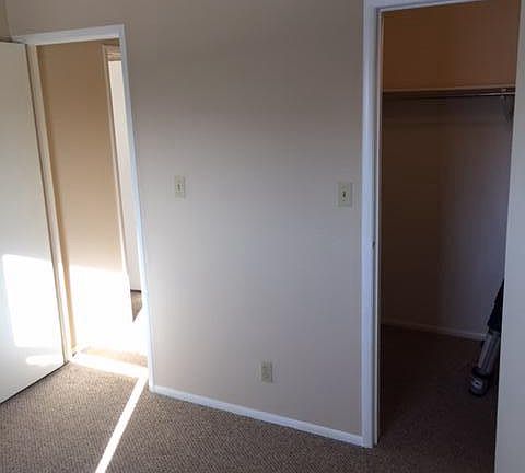 Bedroom with walk in closet