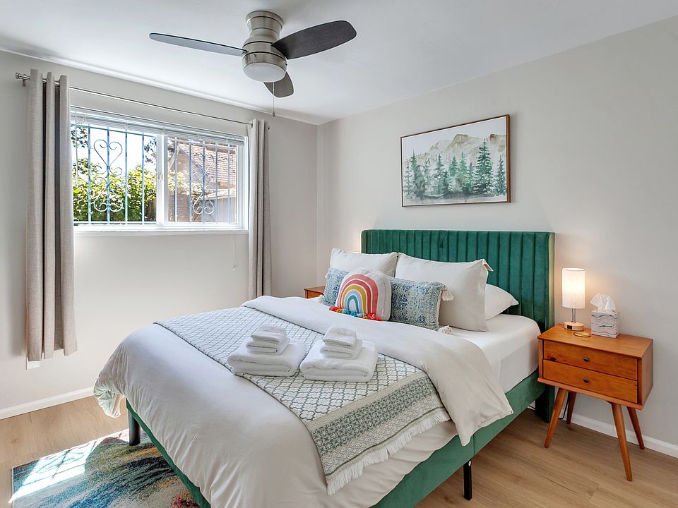 South-facing window lets in abundant natural light. Blackout curtains offer a restful night's sleep.