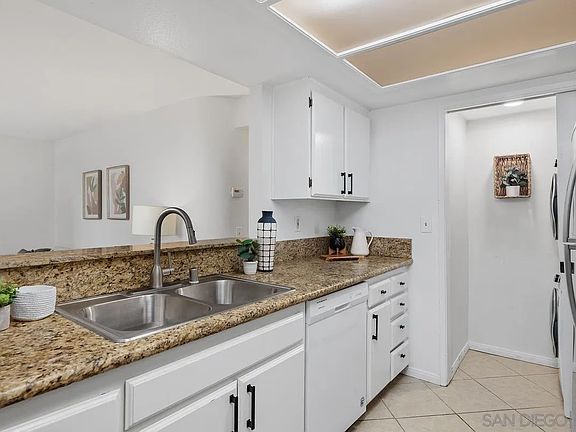 5th image of 9439 Fairgrove Ln Unit 103