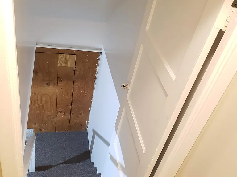Basement staircase (by back door, off the kitchen)