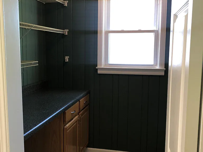 Laundry room with washer/dryer connections located directly off the kitchen