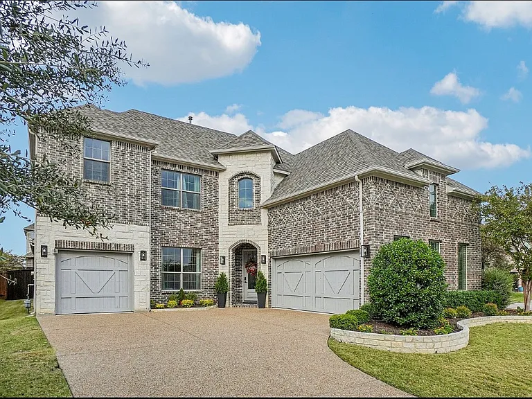 Front of home, split 3 car garage. Large corner lot, fully landscaped yard