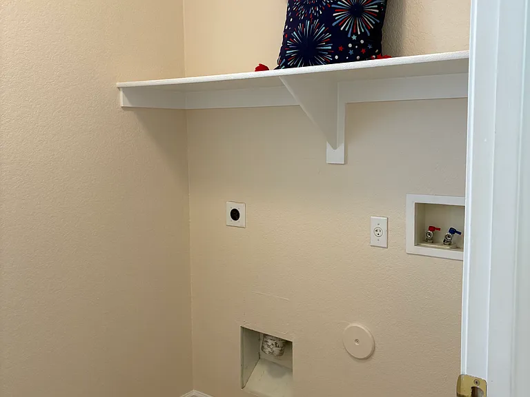 Laundry Room with Electric Washer and Dryer Hook-ups