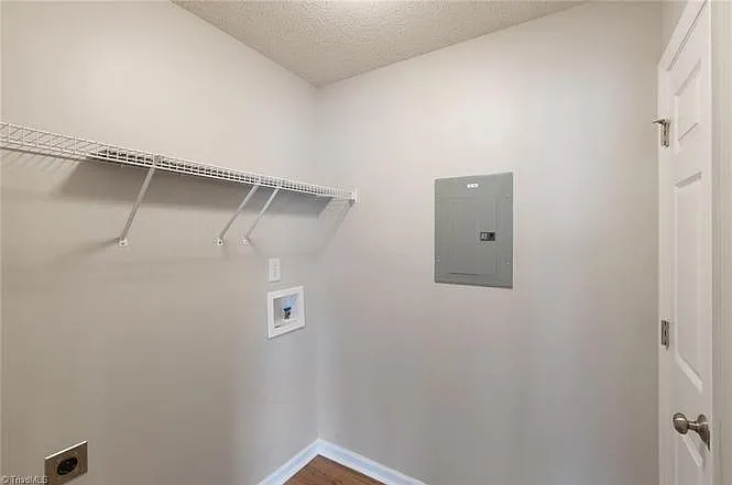 Laundry room area, currently has a washer and dryer