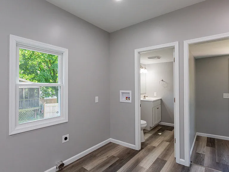 Back of house powder room, Washer and dryer hook up and back door.