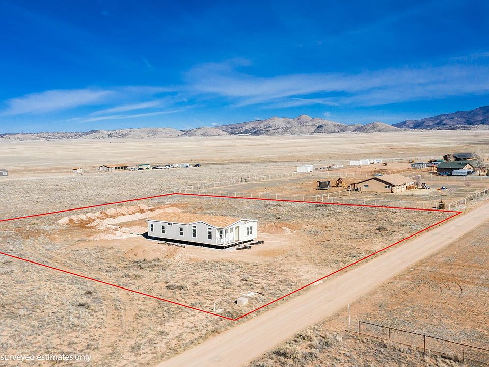 Arial views of Mountains.  Nice open space behind home!