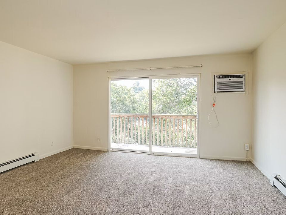 Living Area, and private balcony access.