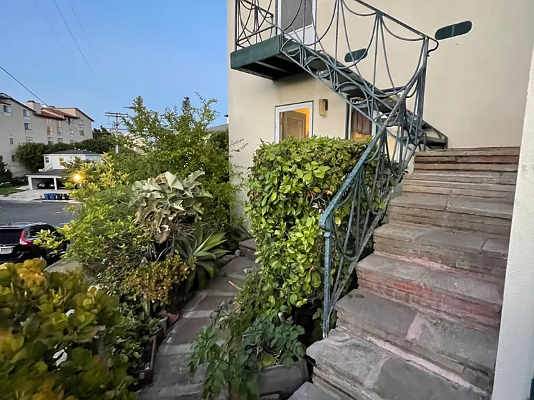 East of front door, your door is conveniently street level.