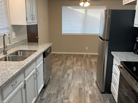 Kitchen/dinette area (all new appliances countertops/flooring/paint and lighting)