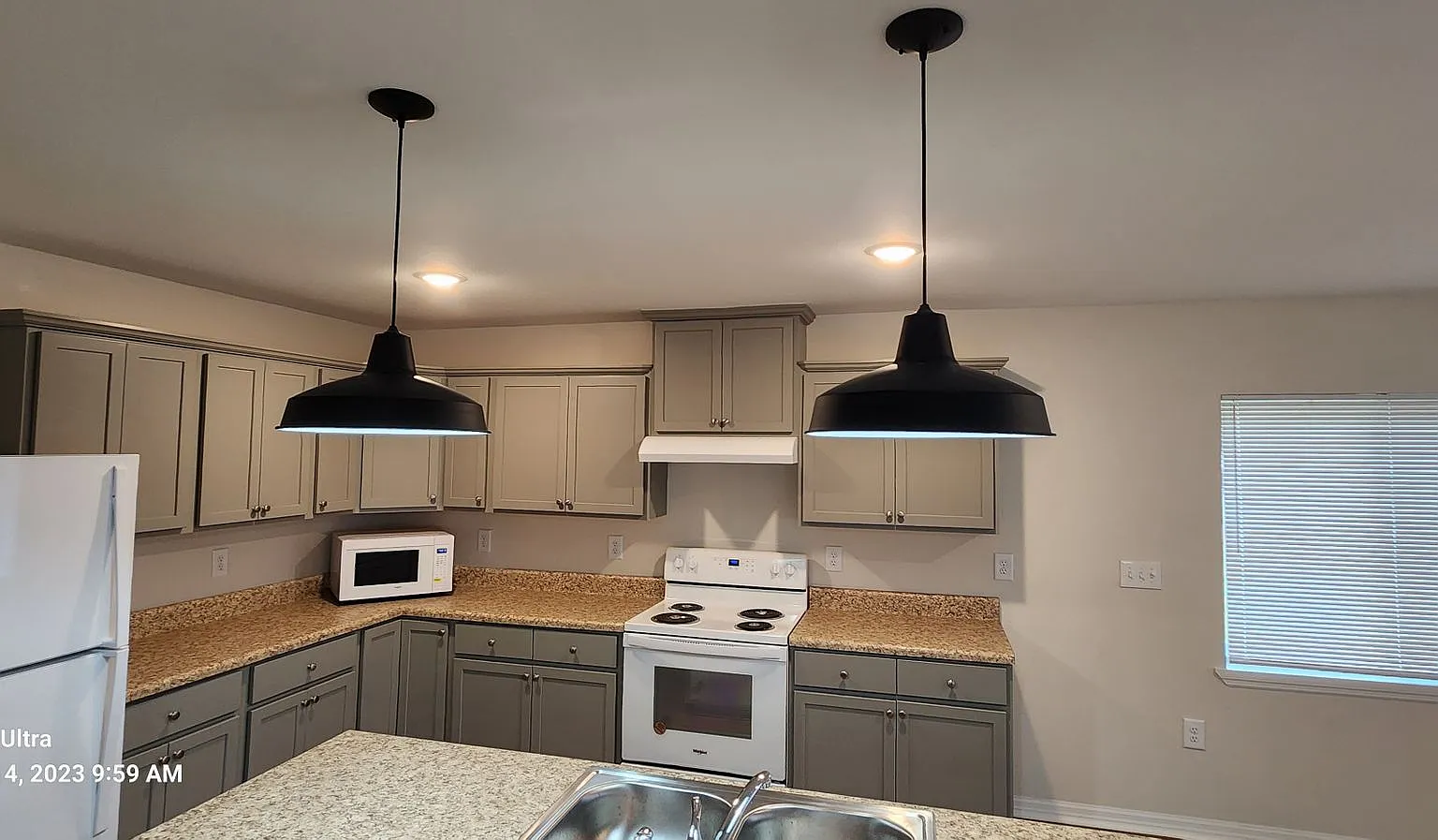 **This charming 2-bedroom, 2-bathroom house offers a cozy and inviting space to make your own** — Photo 3