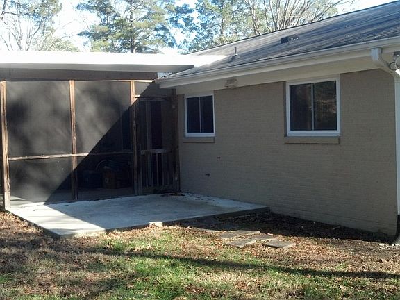 Back screened in porch and patio.