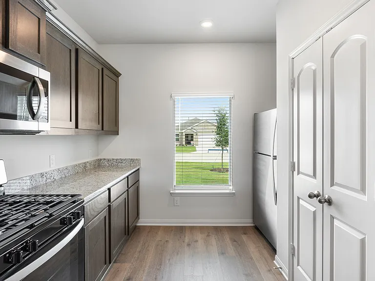 The kitchen has energy-efficient appliances.