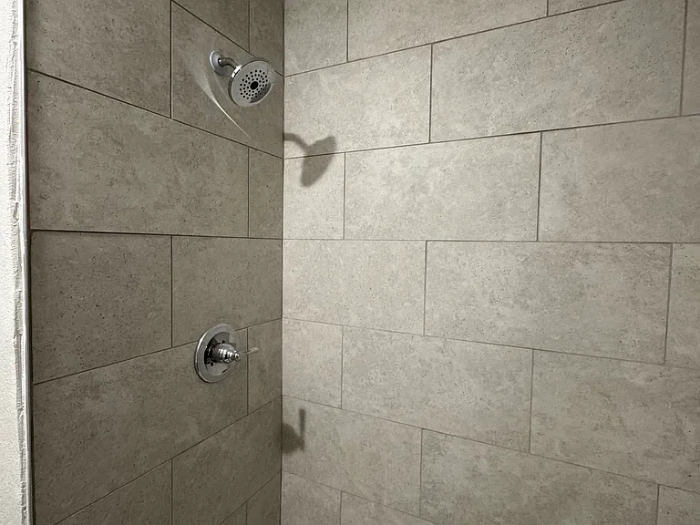 New Shower Tile
New Showerhead
New Shower Handle