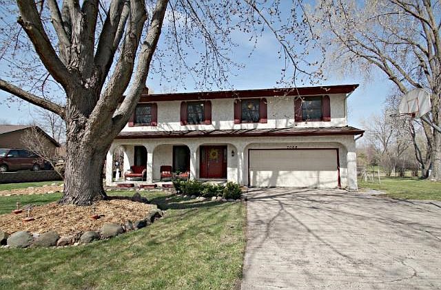 Welcome to this large family home in the heart of  Eden Prairie!