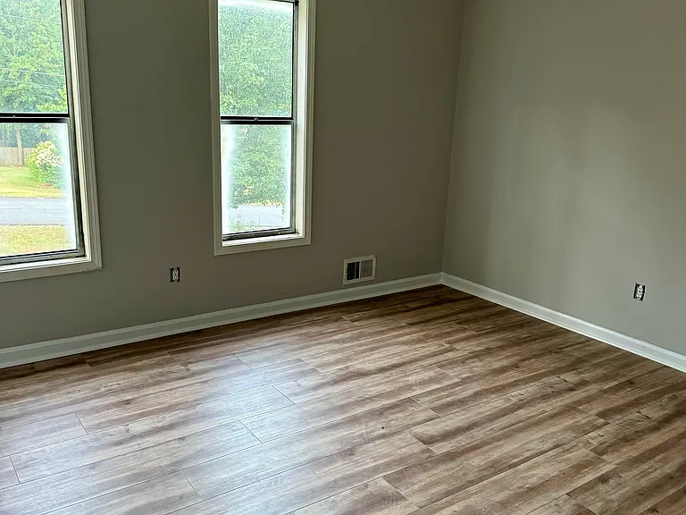 Fresh paint and new flooring throughout.