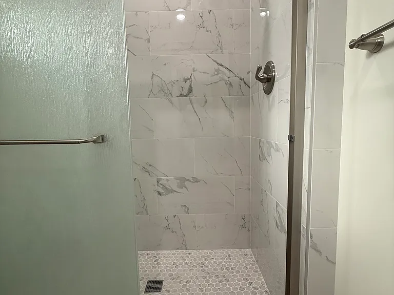 Tiled Shower with Sliding Glass Door