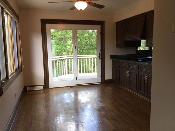 Dining area in kitchen with a deck