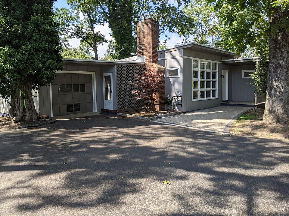 Front of House with Extra Wide Driveway