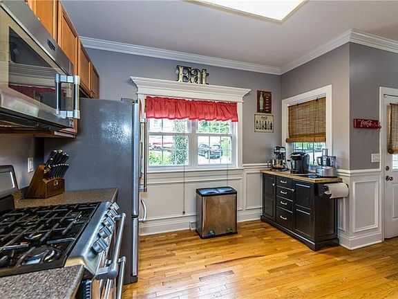 View from the kitchen to the Entrance/Foyer.  Notice the natural light from all these windows!
