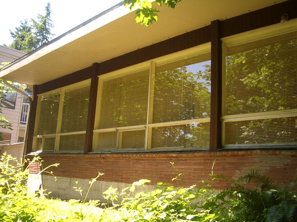 Street/east facing exterior, house sits well above and away from the street.