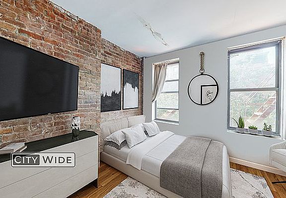2nd image of 309 E 9th St APT 2D