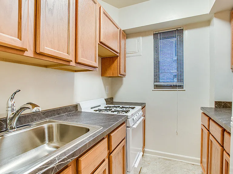 Apartment kitchen with classic finishes