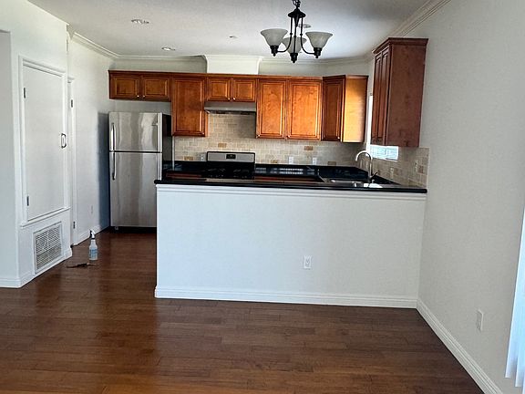 Kitchen and dining area, facing south from living room.