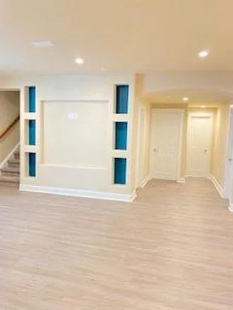 TV Niche and hallway to Bedroom #1 and Bathroom #1.