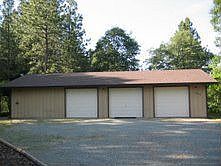 3 car detached garage with guest quarters