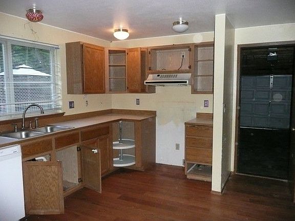 VIEW OF KITCHEN FROM DINING ROOM