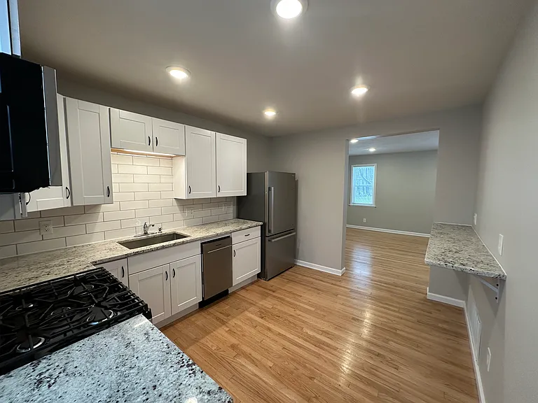64 E Oneida St — Photo 3