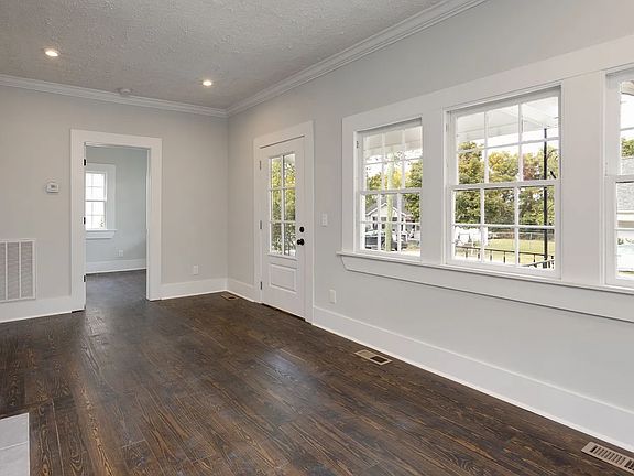 Living room with view of bedroom 2