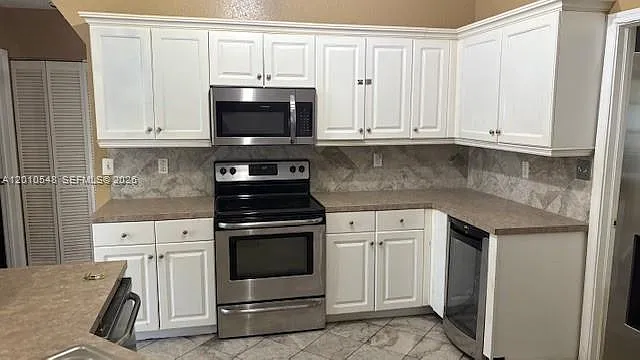 774 NW 16th Pl — Photo 27