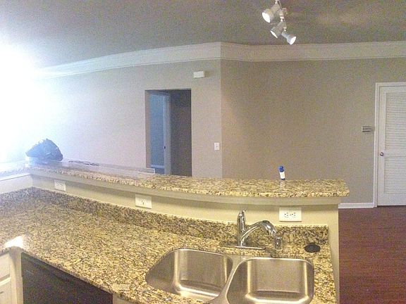 View from the kitchen to the dinning area. This aparment hom