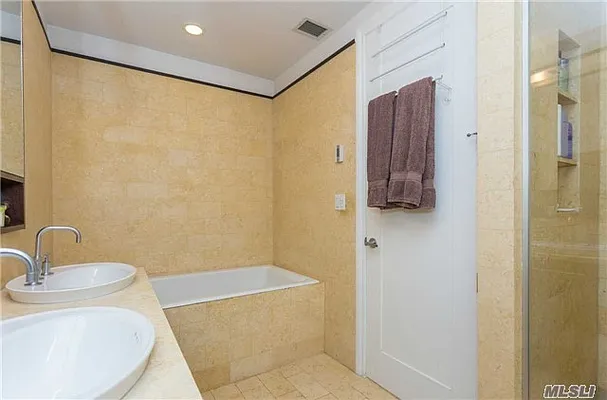 Sold by Douglas Elliman | media 13