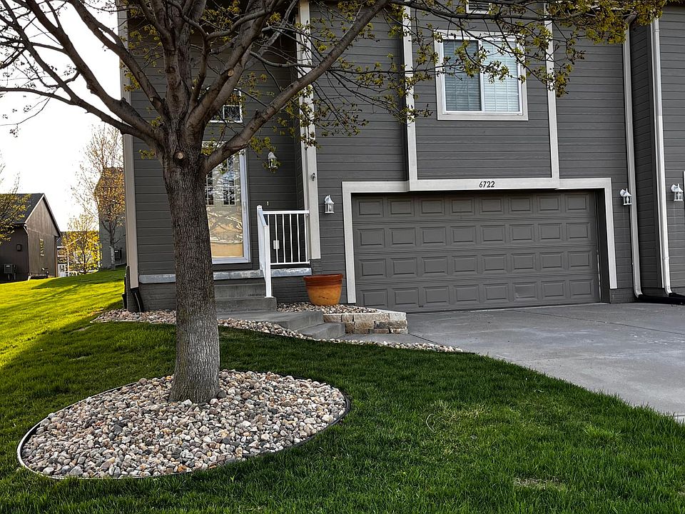 Front entry with crisp new landscaping