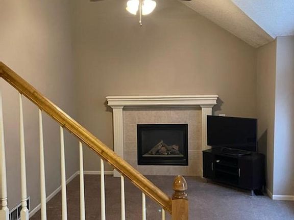 Living room Gas fireplace vaulted ceilings