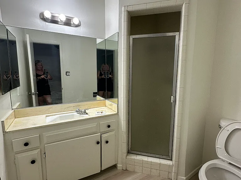 First bath off of the front door in the large bedroom