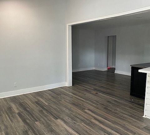 Living and dining area that opens to kitchen