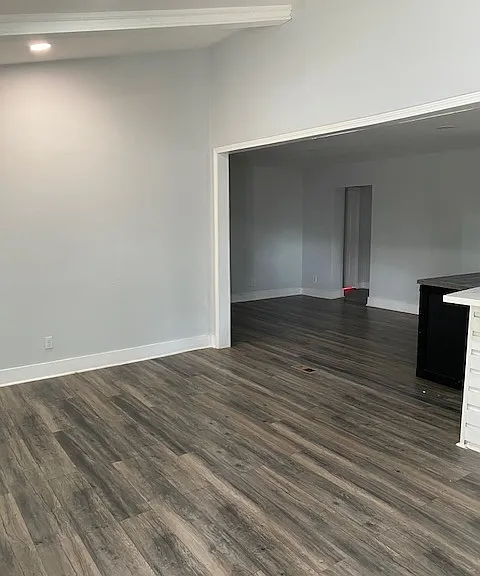 Living and dining area that opens to kitchen