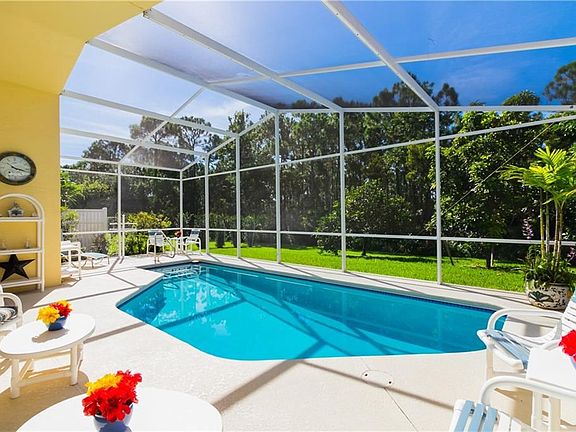 Beautiful re-surfaced pool and screened lanail--perfect for summer days.