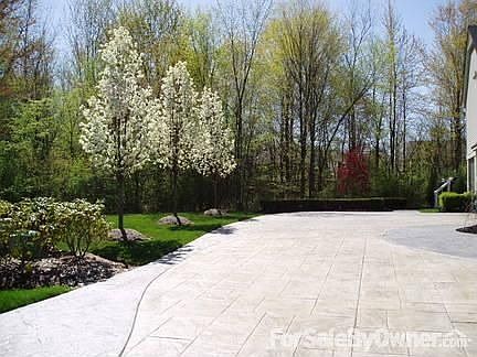 STAMPED CONCRETE DRIVEWAY AND WALK
