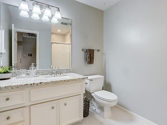 Downstairs full bath with shower to accommodate guests, or a quick pit stop before heading out or getting home.