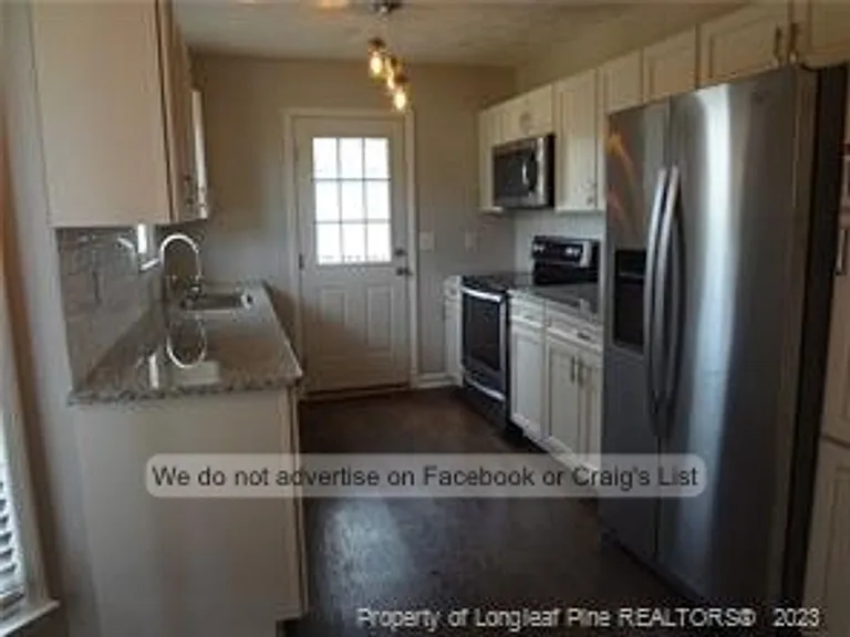 7105 Kearny Ave — Photo 2