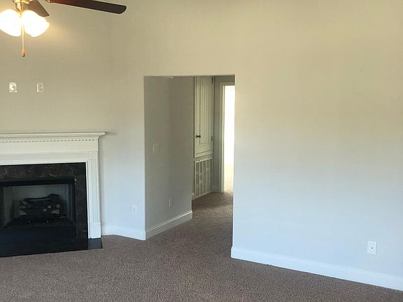 LIVING ROOM AND HALL TO BEDROOMS